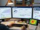 Photographic top-down flat lay of an analyst’s workspace for evaluating sports events on a